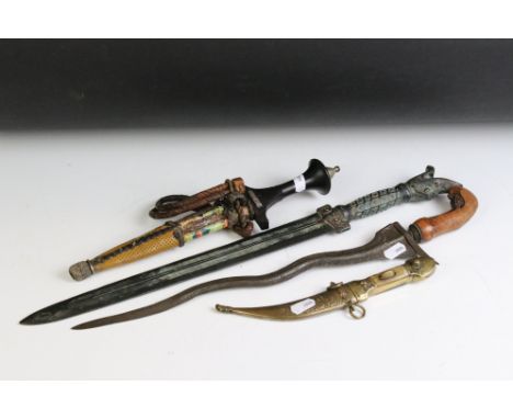 A collection of four vintage Middle Eastern knives. 