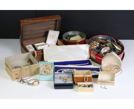 A collection of mainly vintage costume jewellery and watches to include silver examples. 