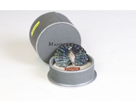 A silver &amp; abalone shell peacock brooch. 