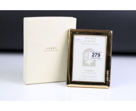 A boxed fully hallmarked sterling silver 23ct gold plated photograph frame. 