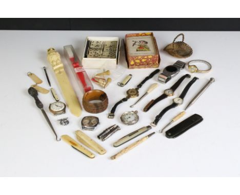 A small box of mixed collectables to include letter opener, pocket watch. playing cards, watches....etc. 