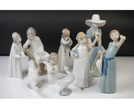 Nine Spanish porcelain figures to include 6 x Lladro examples (4538 Angel Praying, 5010 Prissy Girl, Girl With Lamb, etc), 2 