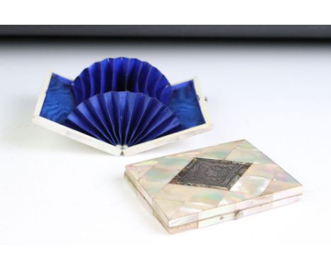 Two early 20th century mother of pearl card cases to include one with white metal cartouche. 