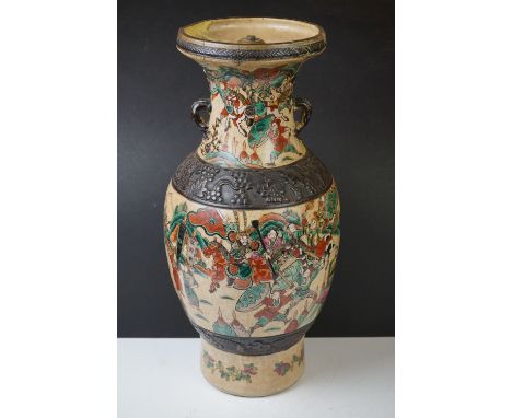 19th Century Chinese twin-handled vase of urn form, converted to a lamp base, in the Nankin style, decorated with a battle sc