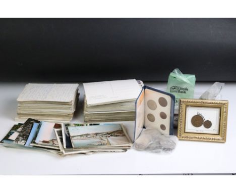 A small collection of topographical postcards together with a collection of mainly British pre decimal coins to include silve
