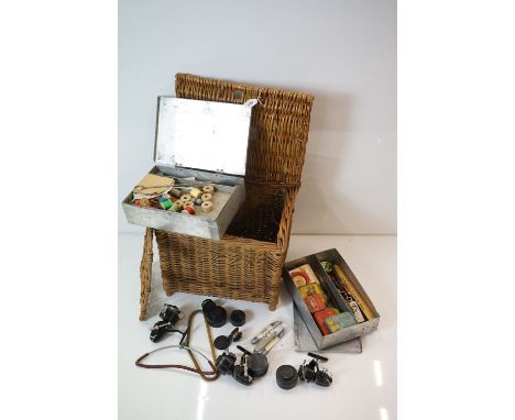 Wicker Fishing Basket fitted with two tin containers and a shelf holding various Fishing Equipment and Accessories including 