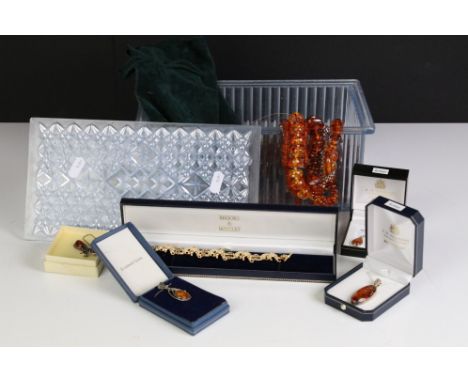 A large collection of Amber jewellery to include many silver mounted examples. 