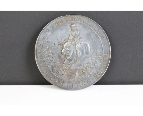 A fully hallmarked sterling silver horse riding medal from The Cadogan Riding School, dated 1950. 