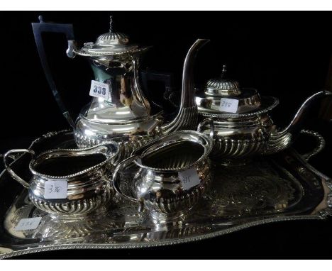 A silver plated four piece tea and coffee service with half fluted decoration together with a Viners silver plated double han
