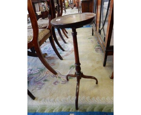 A 19th Century mahogany candle table with circular top inlaid to paterae, on turned tapering column and three downswept legs