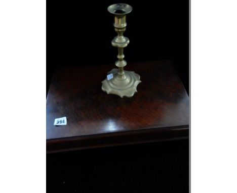 A Georgian brass candlestick on square base and a Victorian mahogany cutlery box
