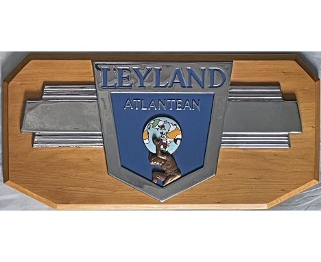 1960s/70s Leyland Atlantean chrome and enamel VEHICLE BADGE depicting Atlas shouldering the globe. The badge measures 15" x 7