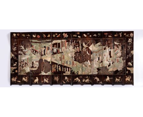 A Twelve-panel Screen, grooved wood en relief, fully coated with brown lacquer, polychrome and gilt decoration with hand pain