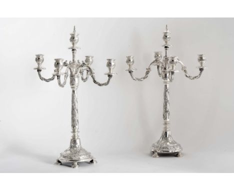 A pair of five-light candelabra, 833/1000 silver, decoration en relief "Garlands", Portuguese, wear signs, Javali mark (1887-