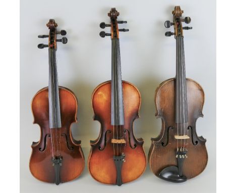 Three early to mid-20th century Czechoslovakian violins, comprising two full size, one bearing label "Nach Christian Meisel V