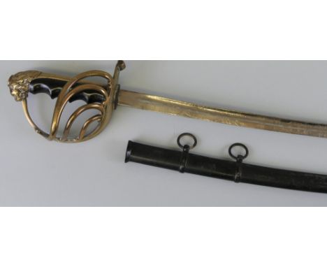 A 20th century naval sword, probably South American, the ornately chased curving 79cm fullered steel blade with brass open fo