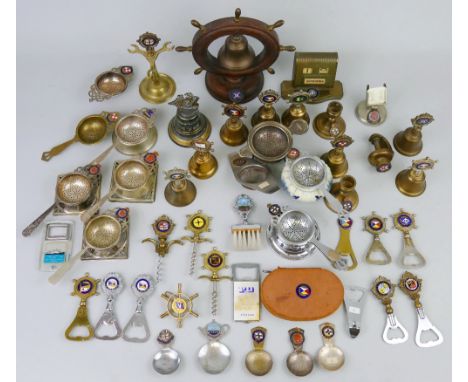 Shipping line souvenirs, comprising ten table bells, eleven tea strainers, five caddy spoons, three cork screws, eleven bottl