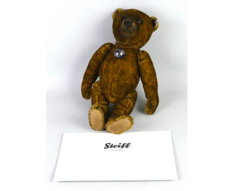 A Steiff limited edition Dante bear, with bell and growler mechanism, No.243/1500 with certificate, 30cm high in original box