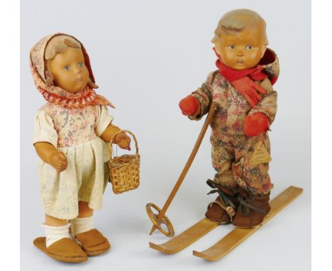 Two Goebel Hummel dolls, one of a boy entitled on tag "Ski-Maserl", with a pair of wooden skis and one cane stick 29cm high, 