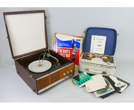 A Decca Capri record player, model no.RP199, serial no.339460, 40cm wide in original cardboard box, together with a carton of