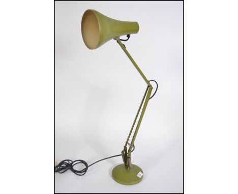 A Retro post war  vintage Herbert Terry and Sons Ltd original anglepoise lamp from the mid century  in sage green , embossed 