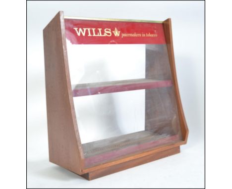 A vintage 20th century Wills Tobacco display cabinet, the cabinet with original notation etc H38cW35xD18cm