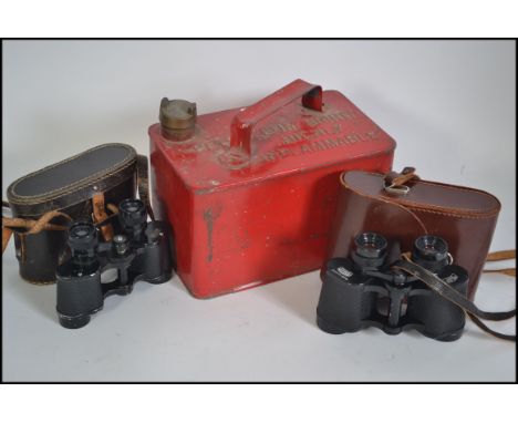 A pair of cased 20th century Carl Zeiss binoculars along with another pair of cased binoculars together with a vintage metal 