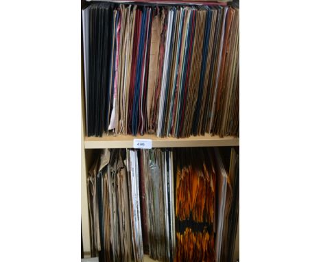 A collection of vintage 78rpm records of various genres, various artists and record labels.