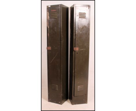 A pair of vintage Industrial mid century lockers in British military green having full length vented doors. 183cm high x 31cm