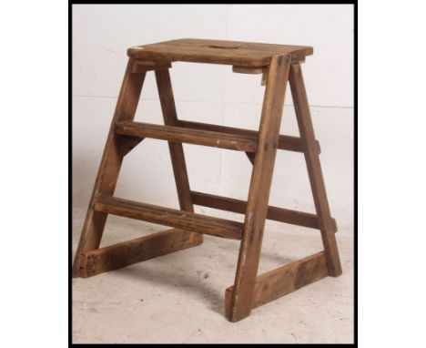 A 20th century Industrial pine 3 step ladder. Of pine construction with fixed setting, 3 steps.  65cm high x 48cm wide x 55cm