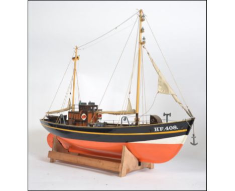 A good vintage model boat ' Elke Finkenwerder '. German ship, on stand. Plastic hull, with highly detailed decking, rigging e