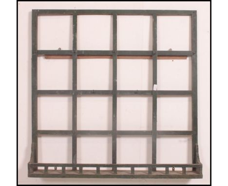 A vintage 20th century painted pine hanging kitchen dresser rack - shelf. painted greed with hooks and lower shelf
