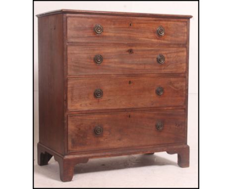 A good Georgian mahogany bachelors chest of drawers being well proportioned. Raised on bracket supports with a 2 short and de