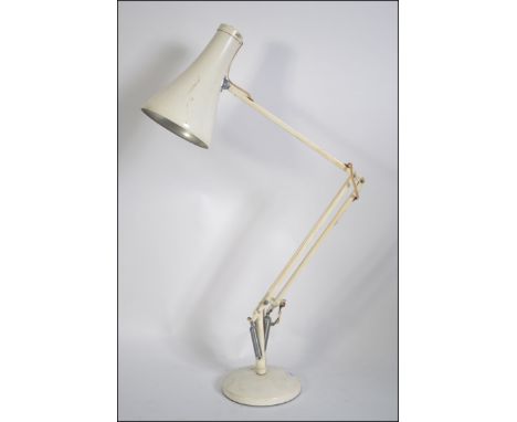 A good early circular base Herbert Terry anglepoise desk top lamp having a pendant shade. 85cm high.