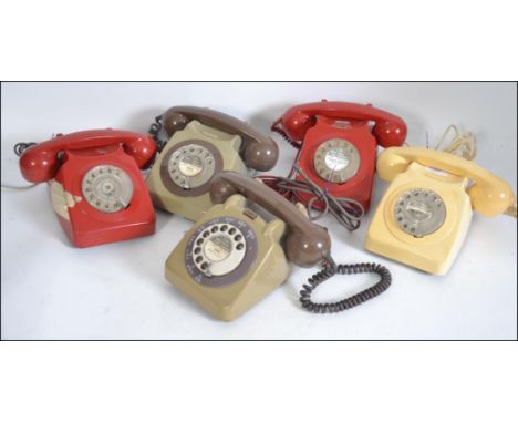 A collection of 5 vintage BT ring dial telephones to include various colours such as red, grey, cream etc ( see illustrations