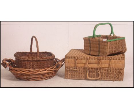 A small stack of vintage whicker items to include brackets x 3 and a vintage picnic hamper