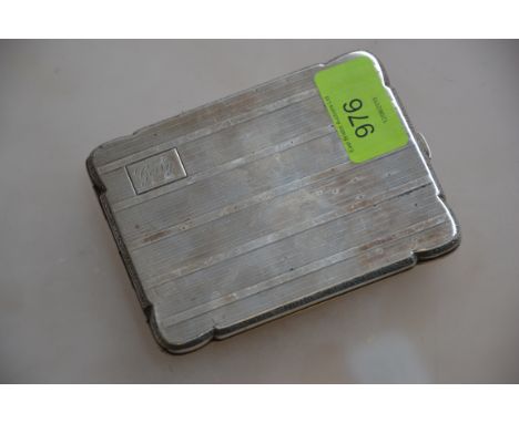 A silver hallmarked cigarette case having an engine turned geometric pattern, having makers mark for TK&amp;Co .925and date l