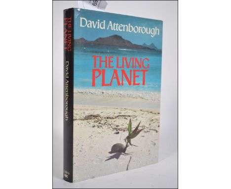 David Attenborough; The Living Planet. BBC 1984 First Edition. Signed by Attenborough in blue pen. Good undedicated signature