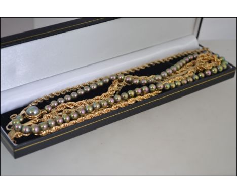 A collection of necklaces and a 9ct gold bracelet to include a simulated pearl necklaces