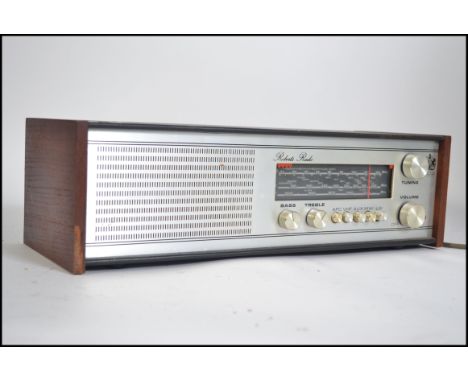 A vintage Roberts radio  model RM 40 having a chrome fascia and teak wooden ends