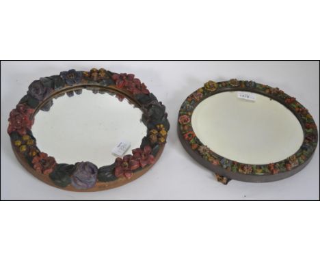A near pair of vintage painted plaster Barbola mirrors one having an easel back and the other being wall hanging