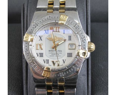 A lady's Breitling bi-metal Starliner bracelet watch, model No.B71340, watch No.1157390, having signed circular ivory Roman d