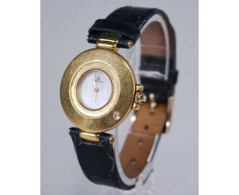 A lady's 18ct gold Jaeger LeCoultre quartz wristwatch, having a signed mother of pearl dial, diamond set deep plain bezel, an