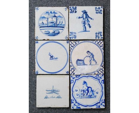 A Dutch blue and white tile, circa 1625-50, depicting a drunkard within ox head corners, 13 x 13cm, together with five simila