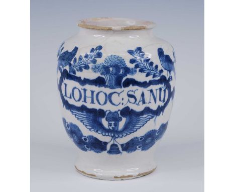 An English blue and white delftware dry drug jar, probably London, circa 1720, of typical form, decorated with birds and foli