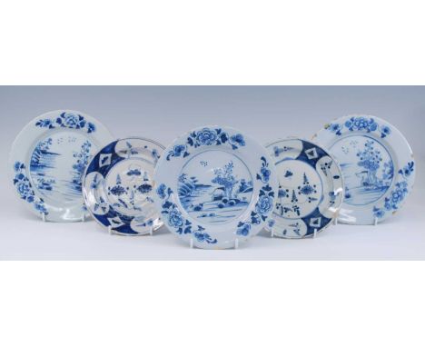 A matched set of three English blue and white delftware plates, 18th century, each decorated with flowers, dia.22.5cm, togeth