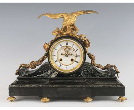 T.A. Simpson &amp; Co of Paris - a late 19th century French black marble and gilt metal mounted mantel clock, the white ename