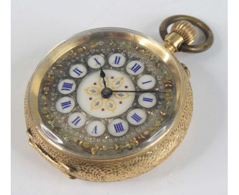 A French lady's 18ct gold cased open face pocket watch, having a jewelled white enamel dial with pierced silvered raised chap