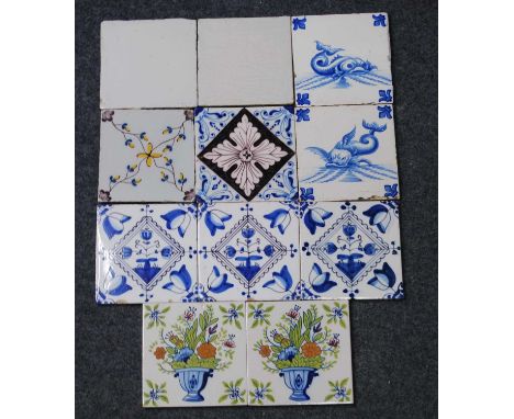 A collection of eleven various delftware tiles, 18th century and later, to include a pair of plain whiteware examples, 13 x 1