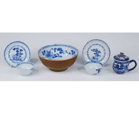 A Chinese blue, white and café au lait porcelain bowl, circa 1750, decorated with flowers within a diaper border, Christie's 